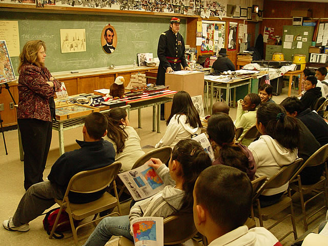 Teacher Ann Kandratino introduces Museum members to the class.