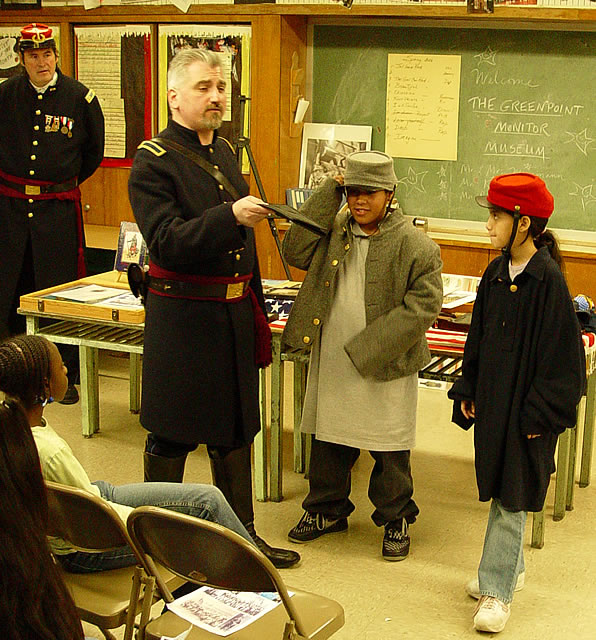 We found a confederate soldier in the class with his gray uniform.