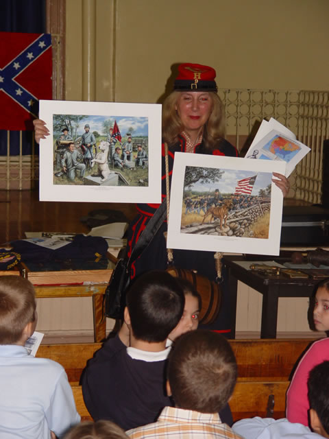 Which is the Confederate mascot?  Which is the Union Mascot?  Stonewall on the left, is the Confederate mascot.  The Confederate soldiers in gray uniforms are holding a Confederate flag.  Sallie, the Union mascot,  is on the right. The Union soldiers have blue uniforms and are carrying the United States Union flag.