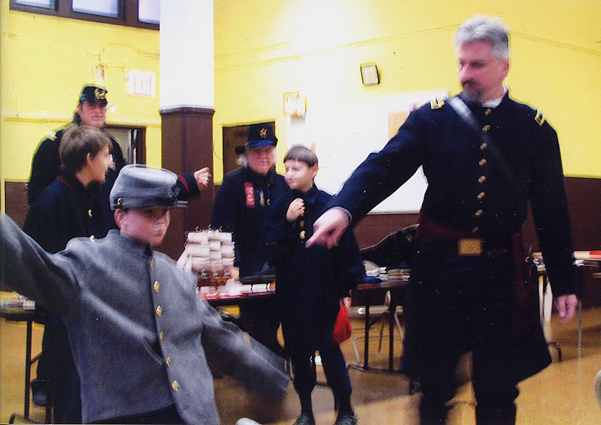 A Confederate soldier in a grey uniform  is found in the class.